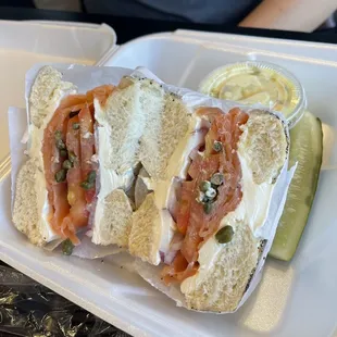 Hand Sliced Nova Sandwich, with potato salad and pickle