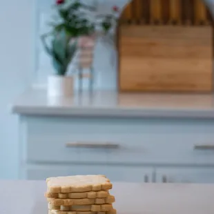 a stack of shortbreads on a countertop