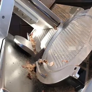 This was their slicer yesterday, extremely unsanitary and she tried to slice my meat on this!