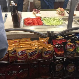 Chip selection and sandwich prep in the background