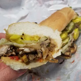 Portobello n cheese. Add jalaps, banana peps, pickles, and relish.