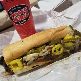 Portobello n cheese. Add jalaps, banana peps, pickles, and relish.