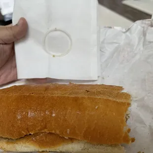 Only two bites into my Chipotle Chicken Cheesesteak sandwich, I find a rubber gasket in it.