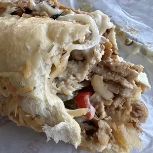 Super yummy! Love the way they mix the cheese and grill everything. #55 Big Kahuna Chicken Cheese Steak