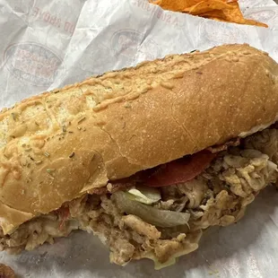 Half eaten because I waited a bit before they gave it to me, but it smelled so good and was amazing!