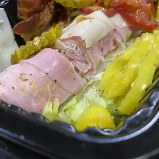 Club sub in-a-tub. You can have the meat flat or have it rolled and sliced.