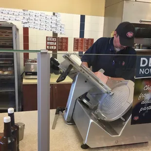 Freshly slicing meats and cheeses