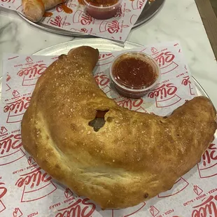 Sausage/pepperoni and Onion Stromboli!