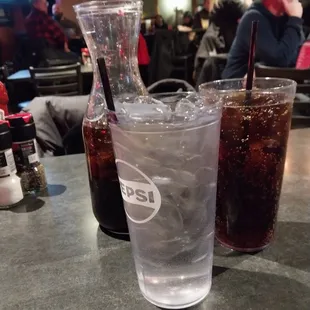 water, pop &amp; a caraffe of pop