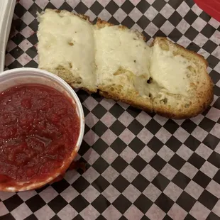 Cheese bread with marinara sauce.