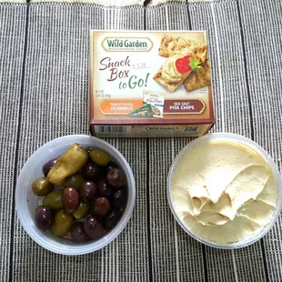 Quick snack of fresh Hummus and olives!