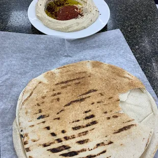 Hummus and bread be like $3