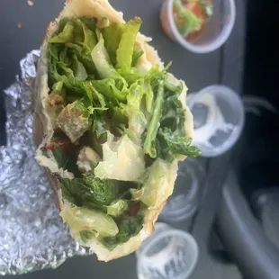 90% lettuce / spinach? Also they put it on the hot grill with the salad inside of it, but it was edible