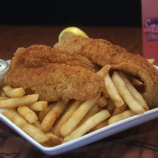 a plate of fried fish and fries