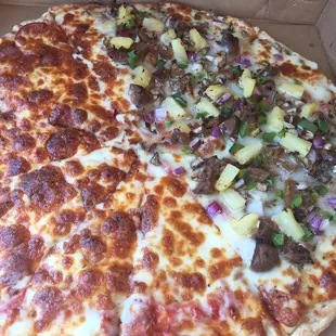 Half veggie cheese and pepperoni/half cheese, pepperoni, mushrooms, Italian sausage, red onion, green pepper and pineapple