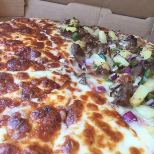 Half veggie cheese and pepperoni/half cheese, pepperoni, mushrooms, Italian sausage, red onion, green pepper and pineapple