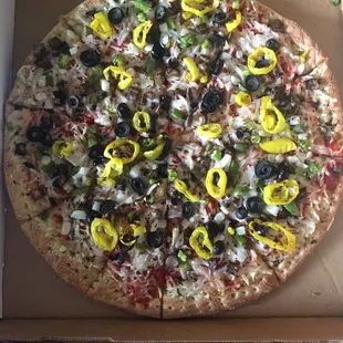 I believe this is the Supreme with sub green olive for mild pepper, add Canadian bacon