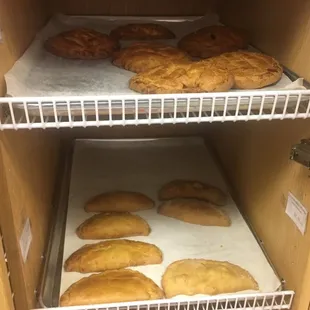 a shelf of baked goods