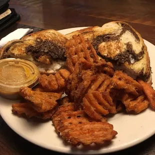 Marbled Turkey Rueben w/ slaw &amp; side of sweet tater waffle fries. Very nice.