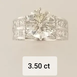 My wife's completed dream ring with a 3.50 ct center stone and wider band with bigger side diamonds.