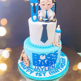 Boss baby cake Raspberry Chambord cake  for bottom, cookies and cream top tier