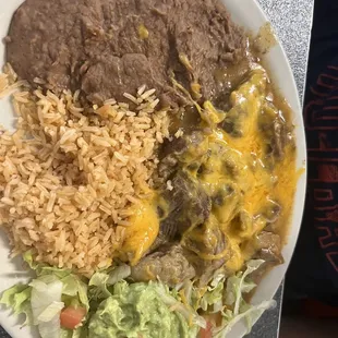 Carne guisada with cheese plate