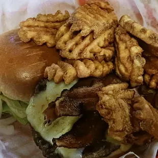 A 1/3 lb burger with Ghost Pepper cheese and bacon and waffle cut fries. Tasty.