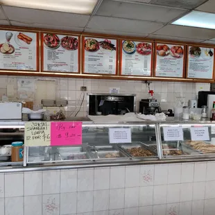 Order and pick up here. Plate lunch Menu is above the prepared food