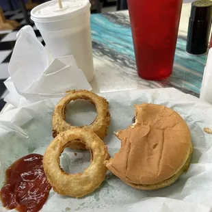 Mini hamburger and small order of onion rings.