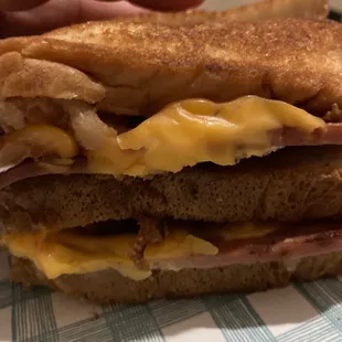 Club sandwich it's made with ham, lots of bacon, lettuce and tomato with mayo