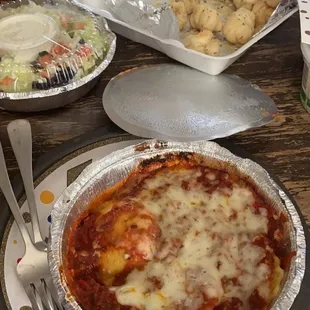 Cheese ravioli (salad comes with pasta) and garlic cheese knots! So tasty!
