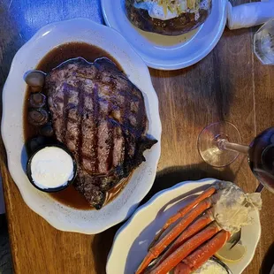 Charbroiled Prime Rib, 1/2 Lb. Snow Crab Legs, and a loaded baked potato