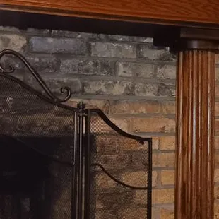 a tv above a fireplace