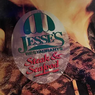 a man cooking a steak