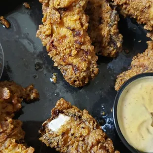 Greasy chicken fingers with honey mustard and cocktail sauce??? WTH??