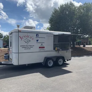 a food truck parked in a parking lot