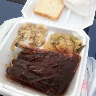 Ribs with fried cabbage and rice and gravy