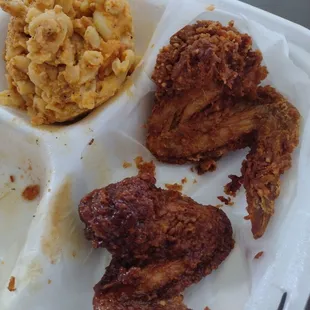 Mac and cheese, one bbq wing, one plain wing.