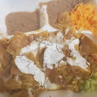 The chilaquiles were supposed to be green. There is barely any rice and beans.