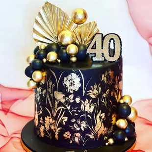 40th gold stenciled birthday cake
