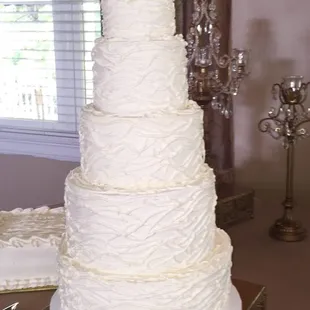 5 Tiered wedding cake w/ fresh floral topper