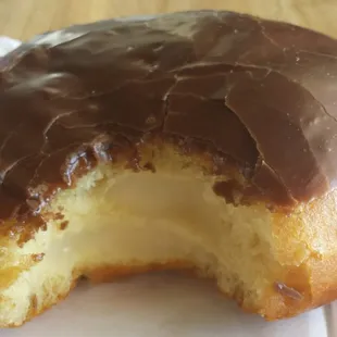 Inside the custard filled chocolate donut.