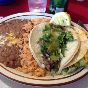 Two tacos + beef . Dirty place, I changed soda and didn&apos;t bring it but the food is tasty except for the reheated rice and beans.