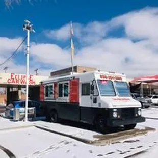 a food truck parked in a parking lot