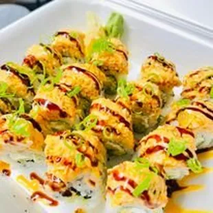 a plate of sushi rolls on a table