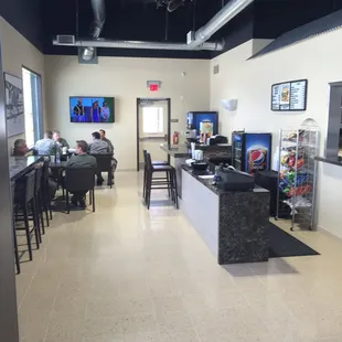 ows people sitting at tables