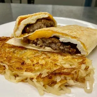 ows a breakfast burrito on a plate