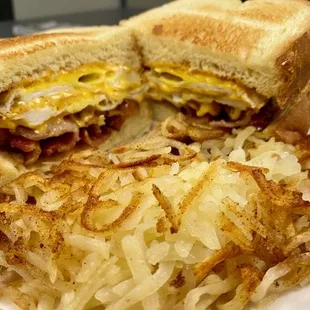 ows a breakfast sandwich and hash browns