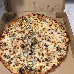 a pizza in a pizza box