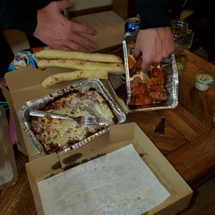 a pizza in a box and a pizza in a box